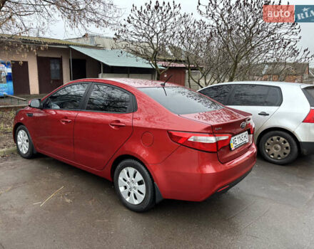 Червоний Кіа Ріо, об'ємом двигуна 1.6 л та пробігом 35 тис. км за 9998 $, фото 4 на Automoto.ua