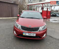 Червоний Кіа Ріо, об'ємом двигуна 1.6 л та пробігом 35 тис. км за 9998 $, фото 18 на Automoto.ua