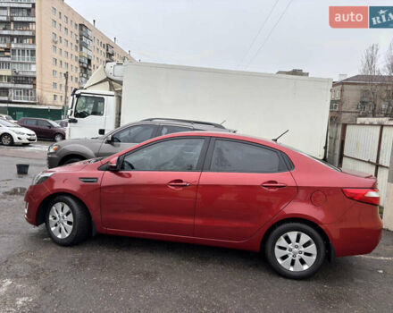 Червоний Кіа Ріо, об'ємом двигуна 1.6 л та пробігом 35 тис. км за 9998 $, фото 25 на Automoto.ua