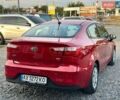 Красный Киа Рио, объемом двигателя 1.6 л и пробегом 75 тыс. км за 7800 $, фото 2 на Automoto.ua