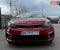 Красный Киа Рио, объемом двигателя 1.4 л и пробегом 84 тыс. км за 12900 $, фото 1 на Automoto.ua