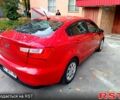 Красный Киа Рио, объемом двигателя 1.6 л и пробегом 90 тыс. км за 10900 $, фото 2 на Automoto.ua