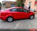 Красный Киа Рио, объемом двигателя 1.6 л и пробегом 90 тыс. км за 10900 $, фото 1 на Automoto.ua