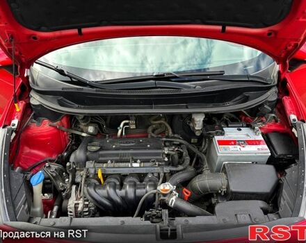Красный Киа Рио, объемом двигателя 1.4 л и пробегом 84 тыс. км за 13200 $, фото 8 на Automoto.ua