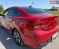 Красный Киа Рио, объемом двигателя 1.59 л и пробегом 150 тыс. км за 10495 $, фото 2 на Automoto.ua