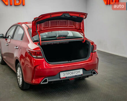 Червоний Кіа Ріо, об'ємом двигуна 1.6 л та пробігом 56 тис. км за 15556 $, фото 7 на Automoto.ua