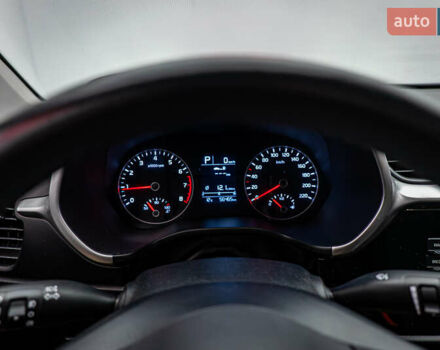 Червоний Кіа Ріо, об'ємом двигуна 1.6 л та пробігом 56 тис. км за 15556 $, фото 13 на Automoto.ua