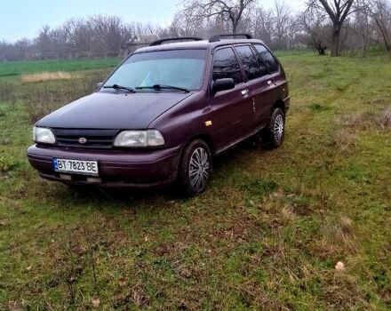 Красный Киа Рио, объемом двигателя 1.3 л и пробегом 80 тыс. км за 1400 $, фото 10 на Automoto.ua