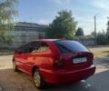 Червоний Кіа Ріо, об'ємом двигуна 1.4 л та пробігом 202 тис. км за 2200 $, фото 2 на Automoto.ua