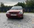 Червоний Кіа Ріо, об'ємом двигуна 1.5 л та пробігом 380 тис. км за 2000 $, фото 1 на Automoto.ua