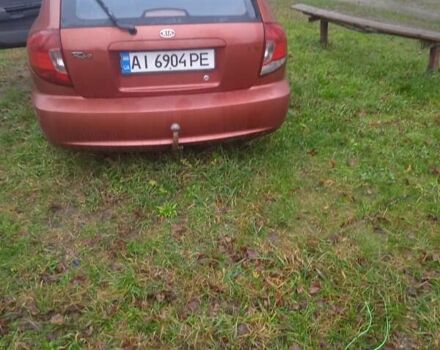 Красный Киа Рио, объемом двигателя 1.5 л и пробегом 320 тыс. км за 1300 $, фото 1 на Automoto.ua
