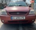 Червоний Кіа Ріо, об'ємом двигуна 1.49 л та пробігом 380 тис. км за 2150 $, фото 1 на Automoto.ua