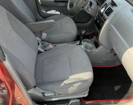 Красный Киа Рио, объемом двигателя 1.5 л и пробегом 380 тыс. км за 2150 $, фото 6 на Automoto.ua