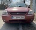 Красный Киа Рио, объемом двигателя 1.5 л и пробегом 380 тыс. км за 2150 $, фото 1 на Automoto.ua