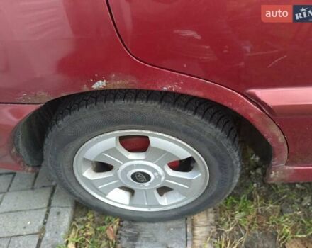 Кіа Ріо 2003 у Харкові на Automoto.ua Червоний Кіа Ріо, об'ємом двигуна 1.34 л та пробігом 221 тис. км за 3212 $, фото 4 на Automoto.ua