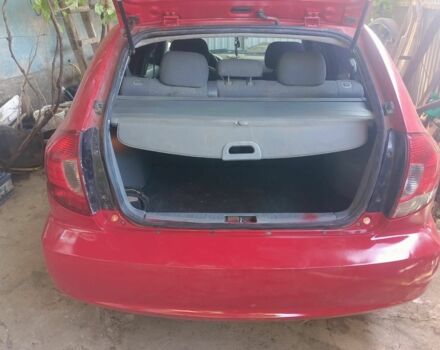 Красный Киа Рио, объемом двигателя 1.5 л и пробегом 300 тыс. км за 2500 $, фото 2 на Automoto.ua