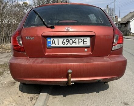 Красный Киа Рио, объемом двигателя 1.5 л и пробегом 380 тыс. км за 2150 $, фото 3 на Automoto.ua