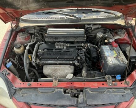 Красный Киа Рио, объемом двигателя 1.5 л и пробегом 380 тыс. км за 2150 $, фото 4 на Automoto.ua