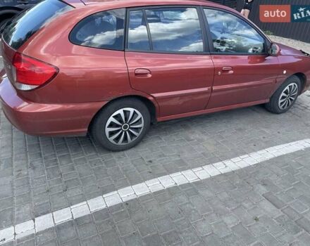 Червоний Кіа Ріо, об'ємом двигуна 1.5 л та пробігом 202 тис. км за 3200 $, фото 4 на Automoto.ua
