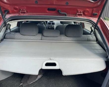 Червоний Кіа Ріо, об'ємом двигуна 1.5 л та пробігом 202 тис. км за 3200 $, фото 13 на Automoto.ua