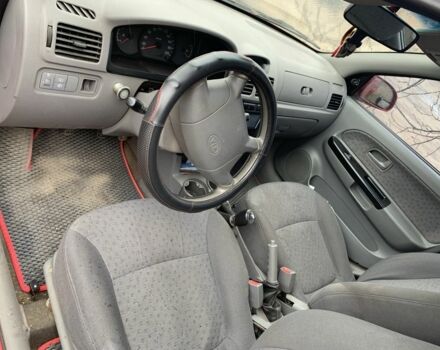 Червоний Кіа Ріо, об'ємом двигуна 1.3 л та пробігом 280 тис. км за 2204 $, фото 5 на Automoto.ua