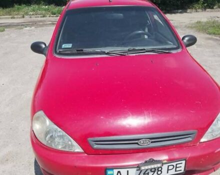 Красный Киа Рио, объемом двигателя 1.4 л и пробегом 327 тыс. км за 1650 $, фото 1 на Automoto.ua