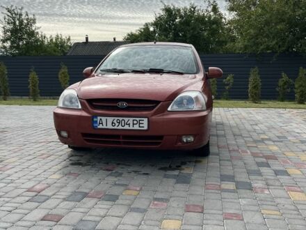 Красный Киа Рио, объемом двигателя 1.5 л и пробегом 380 тыс. км за 2000 $, фото 1 на Automoto.ua