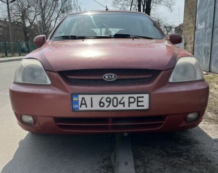 Красный Киа Рио, объемом двигателя 1.5 л и пробегом 380 тыс. км за 2150 $, фото 1 на Automoto.ua