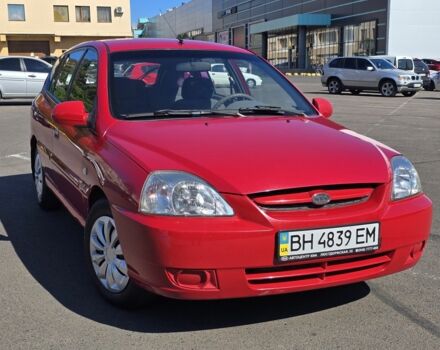 Красный Киа Рио, объемом двигателя 1.3 л и пробегом 132 тыс. км за 3999 $, фото 1 на Automoto.ua