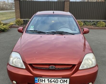 Червоний Кіа Ріо, об'ємом двигуна 1.4 л та пробігом 270 тис. км за 2400 $, фото 1 на Automoto.ua