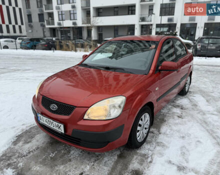 Красный Киа Рио, объемом двигателя 1.4 л и пробегом 244 тыс. км за 4950 $, фото 1 на Automoto.ua