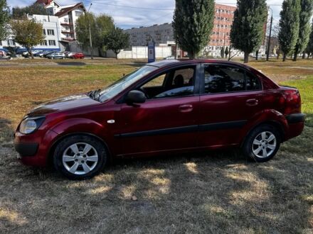 Червоний Кіа Ріо, об'ємом двигуна 1.4 л та пробігом 255 тис. км за 2802 $, фото 1 на Automoto.ua