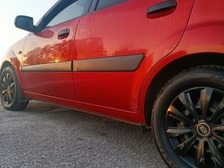 Червоний Кіа Ріо, об'ємом двигуна 1.4 л та пробігом 230 тис. км за 4100 $, фото 1 на Automoto.ua