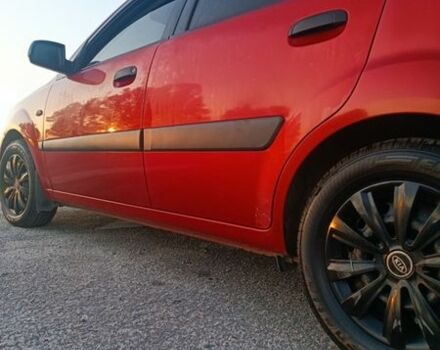 Червоний Кіа Ріо, об'ємом двигуна 1.4 л та пробігом 230 тис. км за 4100 $, фото 1 на Automoto.ua