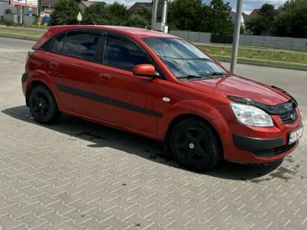 Красный Киа Рио, объемом двигателя 1.4 л и пробегом 257 тыс. км за 5300 $, фото 1 на Automoto.ua