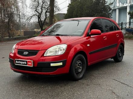 Красный Киа Рио, объемом двигателя 1.4 л и пробегом 189 тыс. км за 6490 $, фото 1 на Automoto.ua