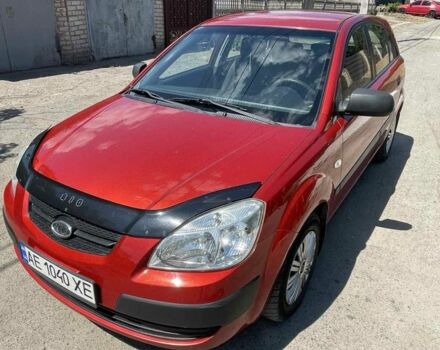 Красный Киа Рио, объемом двигателя 1.4 л и пробегом 205 тыс. км за 4650 $, фото 1 на Automoto.ua