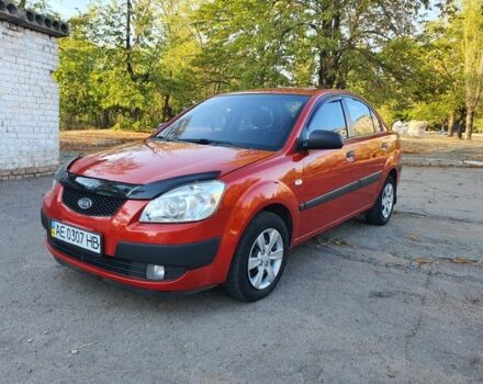 Красный Киа Рио, объемом двигателя 1.4 л и пробегом 205 тыс. км за 4100 $, фото 1 на Automoto.ua