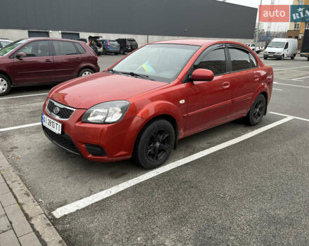 Красный Киа Рио, объемом двигателя 1.4 л и пробегом 179 тыс. км за 5400 $, фото 1 на Automoto.ua