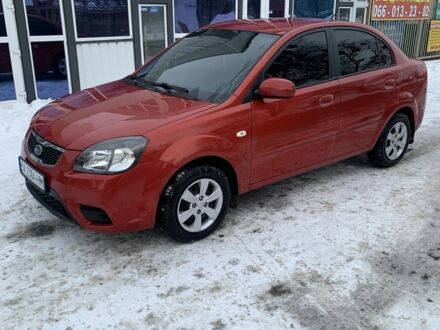Красный Киа Рио, объемом двигателя 1.4 л и пробегом 184 тыс. км за 5300 $, фото 1 на Automoto.ua