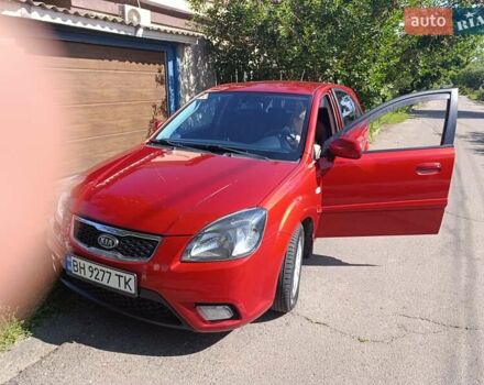 Красный Киа Рио, объемом двигателя 1.4 л и пробегом 229 тыс. км за 6500 $, фото 1 на Automoto.ua