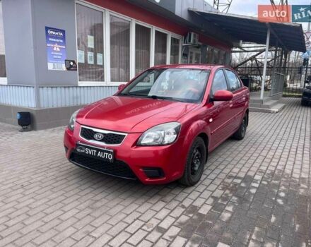 Красный Киа Рио, объемом двигателя 1.4 л и пробегом 113 тыс. км за 5100 $, фото 1 на Automoto.ua