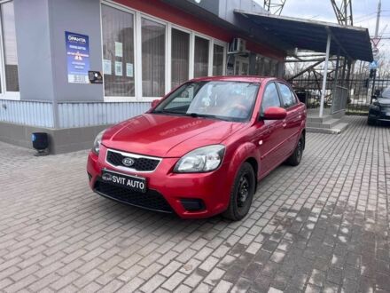 Красный Киа Рио, объемом двигателя 1.4 л и пробегом 113 тыс. км за 5899 $, фото 1 на Automoto.ua
