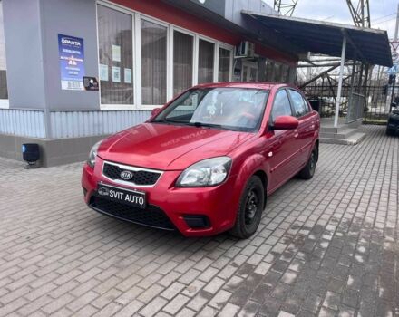 Червоний Кіа Ріо, об'ємом двигуна 1.4 л та пробігом 113 тис. км за 5899 $, фото 1 на Automoto.ua