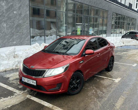 Червоний Кіа Ріо, об'ємом двигуна 1.4 л та пробігом 212 тис. км за 6000 $, фото 1 на Automoto.ua