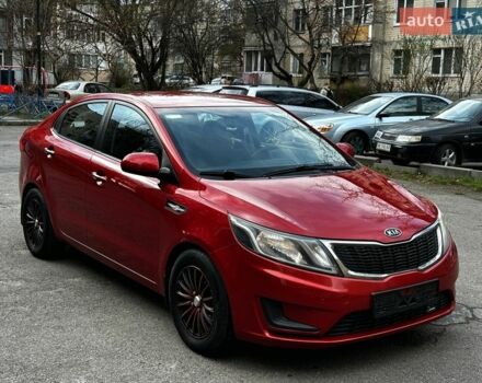 Червоний Кіа Ріо, об'ємом двигуна 1.4 л та пробігом 190 тис. км за 6350 $, фото 1 на Automoto.ua