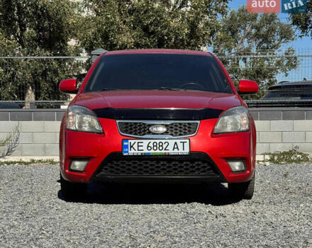 Червоний Кіа Ріо, об'ємом двигуна 1.4 л та пробігом 211 тис. км за 5700 $, фото 1 на Automoto.ua