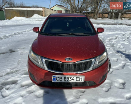 Червоний Кіа Ріо, об'ємом двигуна 1.4 л та пробігом 170 тис. км за 4500 $, фото 1 на Automoto.ua