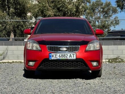 Красный Киа Рио, объемом двигателя 1.4 л и пробегом 211 тыс. км за 5500 $, фото 1 на Automoto.ua