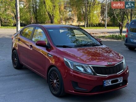 Красный Киа Рио, объемом двигателя 1.4 л и пробегом 190 тыс. км за 5999 $, фото 1 на Automoto.ua